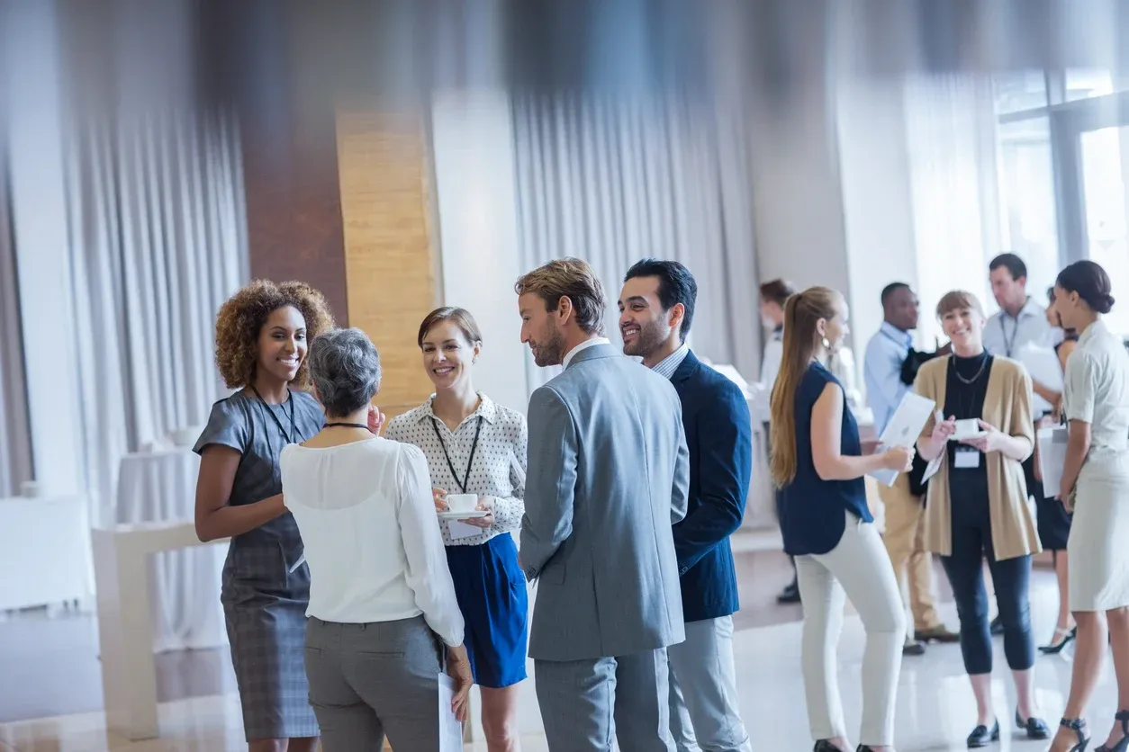 Corporate employees chatting.webp