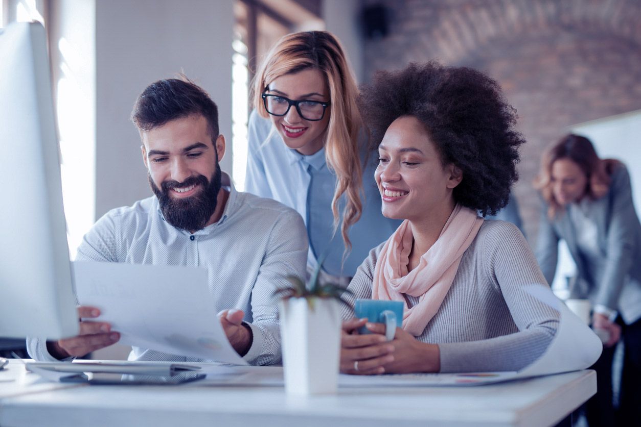 Three colleagues planning a meeting.jpg