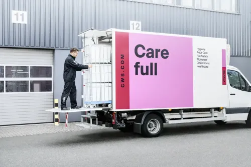 cws-hygiene-key-visual-service-delivery-employee-cotton-towel-roll-truck-english-4.jpg.webp